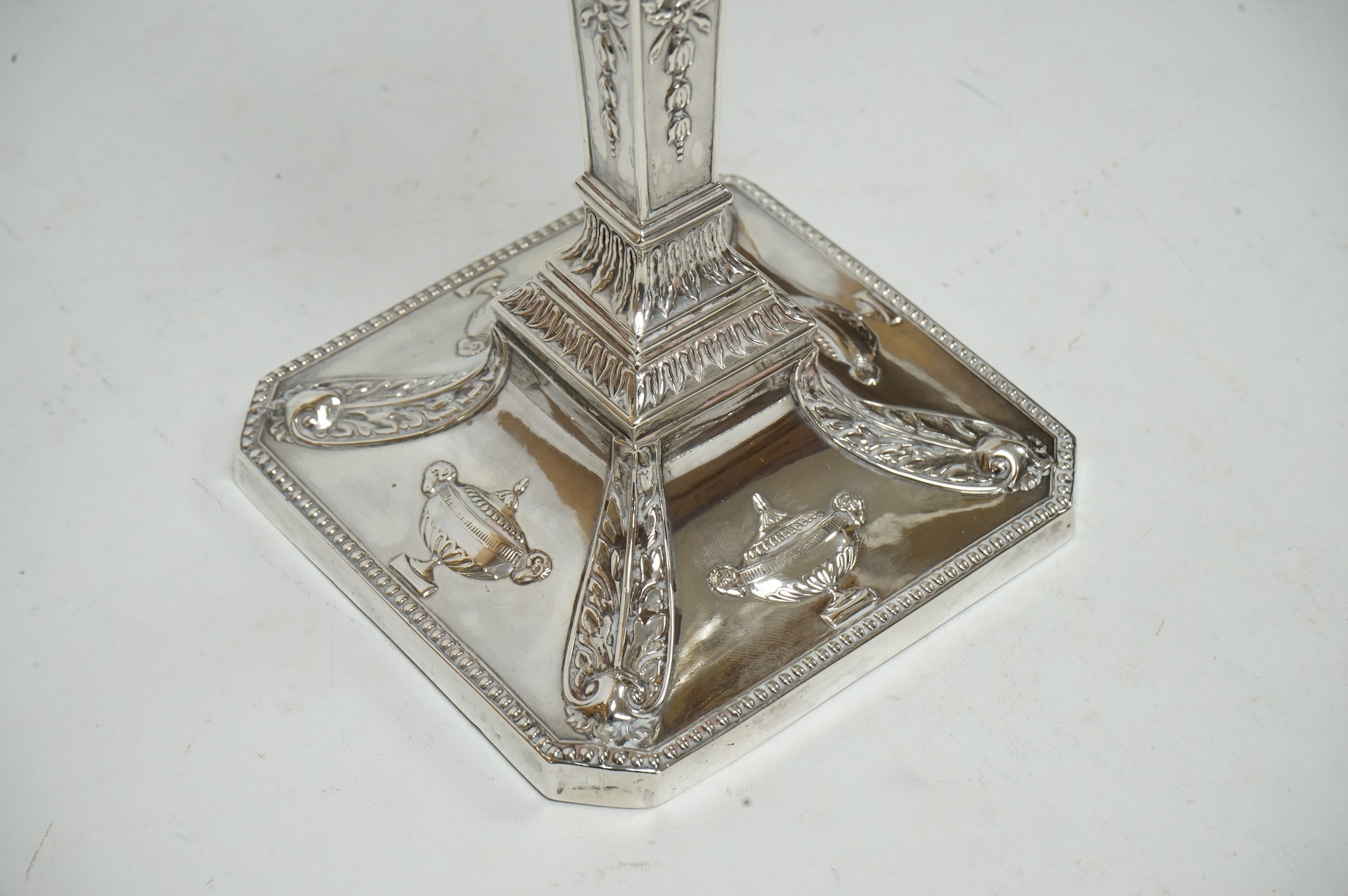 A late Victorian silver candelabrum, by William Aitken, Chester, 1898, (arms unmarked but test as silver), height 31cm, weighted